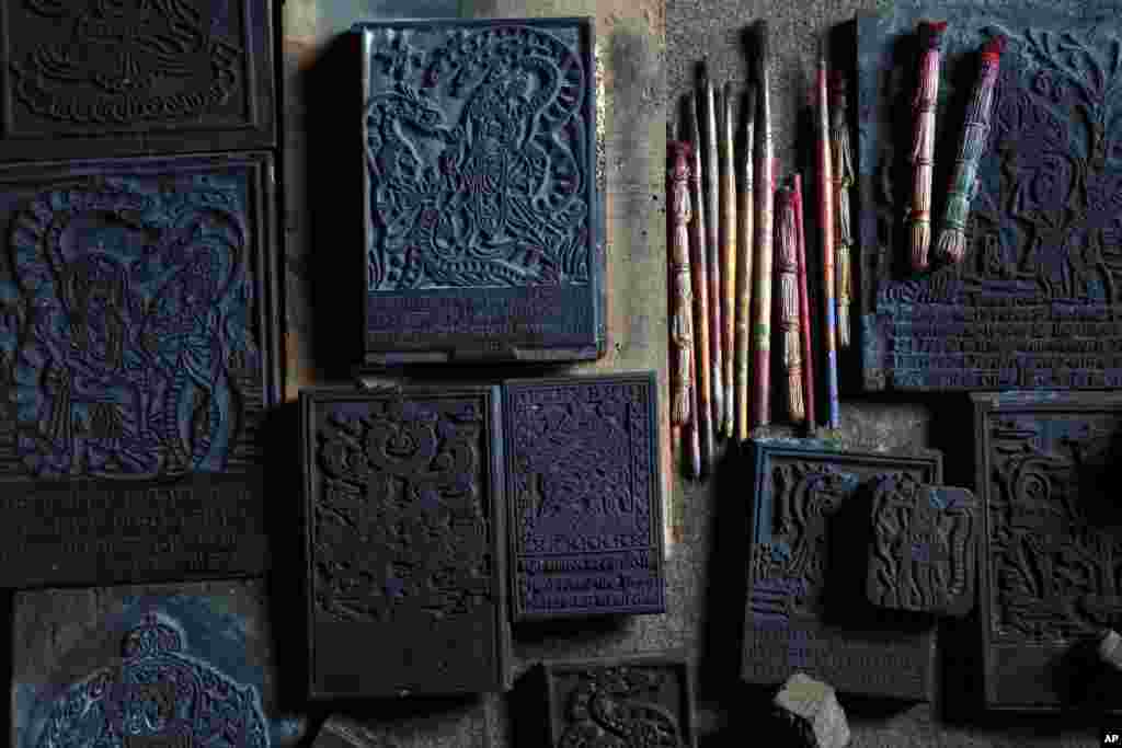 Wooden stamps, which are used to make traditional paintings, are displayed at the residence of Chitrakar couple Tej Kumari and Purna, in Bhaktapur, Nepal, July 31, 2019. 