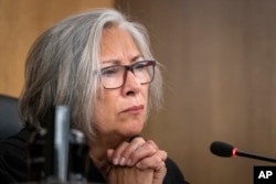 Judge Kathryn Quaintance listens as former Minneapolis police officer Mohamed Noor reads a statement before sentencing Friday, June 7, 2019, in Hennepin County District Court in Minneapolis.