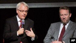 Ivo Josipovic, the current President of Croatia, (L) sits with Bakir Izetbegovic, a member of the Presidency of Bosnia and Herzegovina on a panel hosted by the Clinton Foundation to recognize the 15-year anniversary of the Dayton accords, February 9, 2011