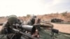 تفنگ تک‌تیرانداز «صیاد ای‌ام-۵۰» ساخت ایران در دست چند شبه‌نظامی حماس.