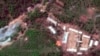 FILE - This Wednesday, May 23, 2018 satellite file image provided by DigitalGlobe, shows the Punggye-ri test site in North Korea.
