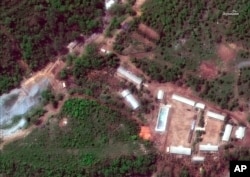 FILE - This May 23, 2018, satellite file image provided by DigitalGlobe, shows the Punggye-ri test site in North Korea.