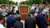 Cambodian and foreigner reporters pay respects during a ground-breaking ceremony for a memorial to journalists killed during the Cambodian conflict, south of Phnom Penh, file photo. 