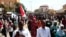 Sudanese domonstrators take part in a rally to protest against last year's military coup, in the capital Khartoum, on Jan. 30, 2022.