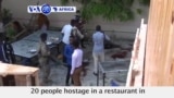 VOA60 Africa- 29 people killed after IS car bombing and hotel gun attack in Mogadishu