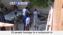VOA60 Africa- 29 people killed after IS car bombing and hotel gun attack in Mogadishu