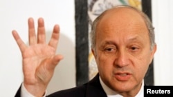 French Minister for Foreign Affairs Laurent Fabius speaks during a media conference in Tunis, May 14, 2013 file photo. 