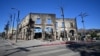 A building that once housed restaurants and coffee shops among other businesses is seen destroyed by the Palisades Fire in Pacific Palisades, California, on Jan. 12, 2025. 