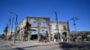 A building that once housed restaurants and coffee shops among other businesses is seen destroyed by the Palisades Fire in Pacific Palisades, California, on Jan. 12, 2025. 