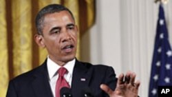 U.S. President Barack Obama speaks during a joint press availability with German Chancellor Angela Merkel (not pictured) in the White House, June 7, 2011