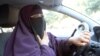 Kenza Drider, Muslimah yang mengenakan niqab, mengendarai mobilnya di Avignon, Perancis selatan.