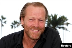 Actor Iain Glen poses while promoting the television series "Jack Taylor" in Cannes, France, October 3, 2011.