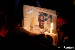 A photograph of Charleston Hartfield, an off-duty Las Vegas police officer who was killed during the Route 91 music festival mass shooting, is pictured during a memorial service in Las Vegas, Oct. 5, 2017.