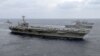 美军航母战斗群抵港 促和平解决海域争端