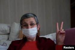 FILE - Pro-Kurdish Peoples' Democratic Party (HDP) lawmaker Leyla Guven, who is on hunger strike for nearly three months, is pictured at her home after being released from prison, in Diyarbakir, Turkey, Jan. 25, 2019.