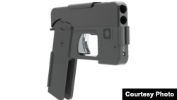 A Minnesota company has designed a gun that folds and looks like a smartphone.