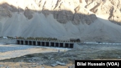 FILE - Army vehicles are seen on the way to Leh in the Himalayan region of Ladakh, India, on Oct. 6, 2021. Five Indian soldiers died in Ladakh on June 29, 2024.