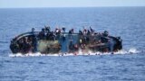 This handout picture by the Italian Navy (Marina Militare) shows the shipwreck of an overcrowded boat of migrants off the Libyan coast. At least seven migrants have drowned after the overcrowded boat overturned, the Italian Navy said. Five hundred people were pulled to safety, but rescue operations were continuing and the death toll could rise, the navy said.