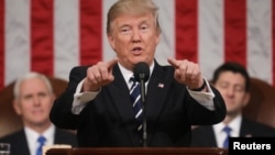 U.S. President Donald Trump delivers his first address to a joint session of Congress