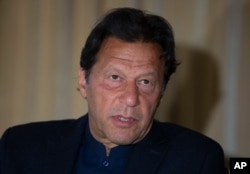 FILE - Pakistan's Prime Minister Imran Khan speaks to The Associated Press, in Islamabad, March 16, 2020.