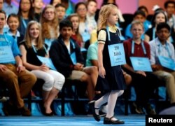 Edith Fuller, 6, of Tulsa, Oklahoma, takes the stage during the 2017 Scripps National Spelling Bee at National Harbor in Oxon Hill, Md., May 31, 2017. Edith is the youngest speller at the 90th national bee.