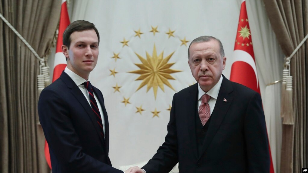 Turkey's President Recep Tayyip Erdogan shakes hands with Jared Kushner (L), U.S. President Donald Trump's adviser, prior to their meeting at the Presidential Palace in Ankara, Turkey, Feb. 27, 2019. 