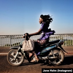 Riding over the Niger River in Bamako, Mali. @janehahn from the book “Everyday Africa: 30 Photographers Re-Picturing a Continent”