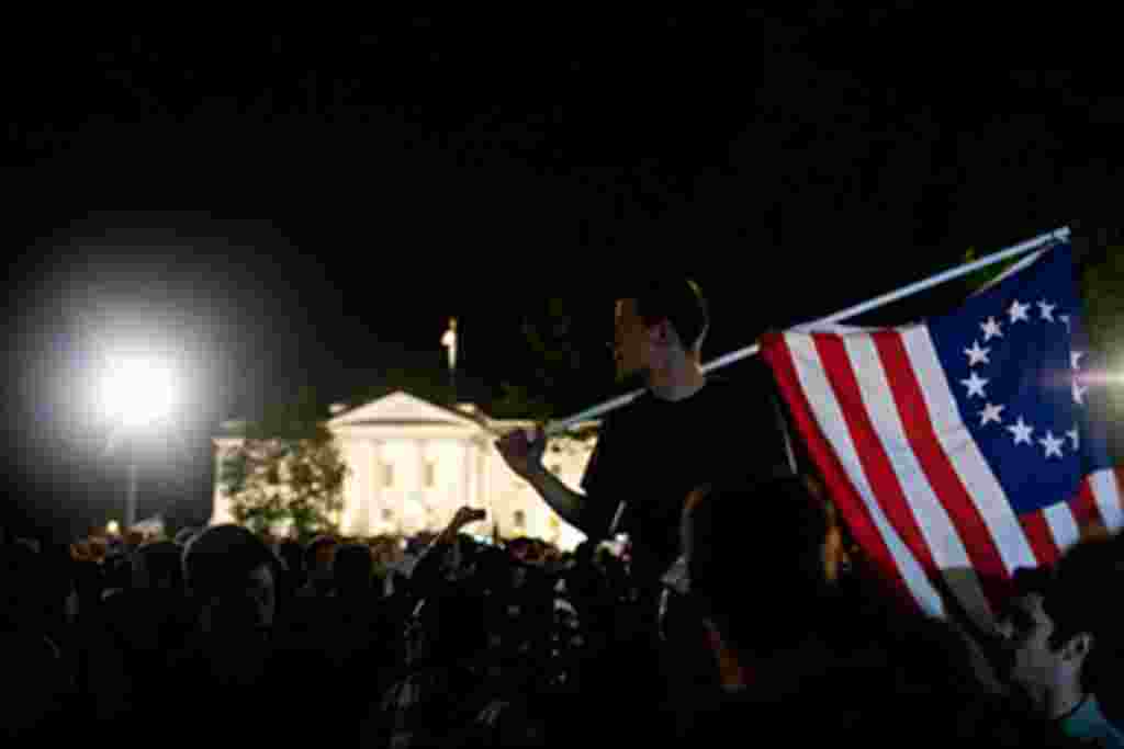 Celebrations erupt at the White House in Washington, D.C. at the news of the death Osama bin Laden, May 2, 2011.