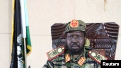 South Sudan's President Salva Kiir, sits in his office in Juba on December 16, 2013. Kiir declared a curfew in Juba on Monday after overnight clashes between rival factions of soldiers, but said his government has regained full control of the capital.