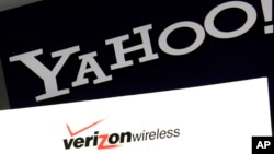 The Yahoo and Verizon logos on a laptop, in North Andover, Massachusetts, July 25, 2016.