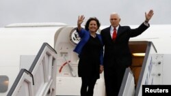 FILE - U.S. Vice President Mike Pence and his wife, Karen, wave as they prepare to depart Ben Gurion International Airport, near Tel Aviv, Israel, Jan. 23, 2018. The Pences leave Monday for a trip to Northeast Asia, including a stop at the Pyeongchang Gam