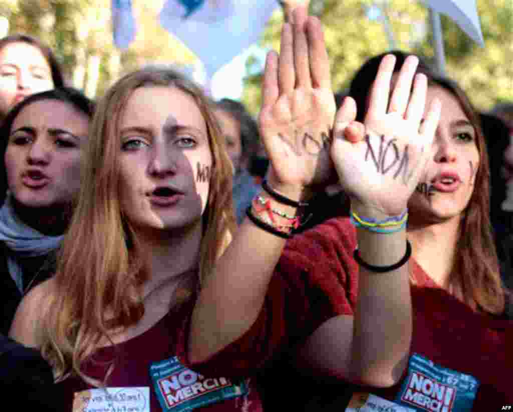 French students hold up their hands painted with "No" during a protest in Paris, Thursday Oct. 21, 2010. Protesters blockaded Marseille's airport, Lady Gaga canceled concerts in Paris and rioting youths attacked police in Lyon on ahead of a tense Senate v