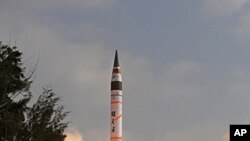 India's Agni-V missile lifts off from the launch pad at Wheeler Island off India's east coast, April 19, 2012.