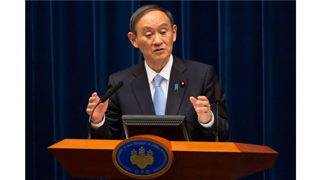 PM Jepang Yoshihide Suga dalam konferensi pers di Tokyo, Jepang, 5 Maret 2021. (Yuichi Yamazaki/Pool via AP)
