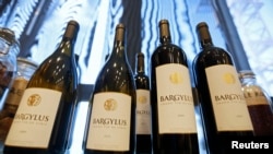 FILE - Wine bottles of Domaine de Bargylus are displayed in Beirut, Lebanon, Sept. 3, 2014. 