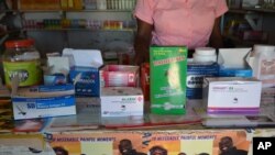 FILE - Malaria drugs are seen on display in a privately owned pharmacy in Blantyre, Malawi. (L. Masina/VOA). 