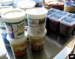 A variety of containers, some of them recycled, are used during Soup Swap night.