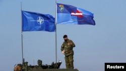 Навчання військ NATO у Латвії, яка разом з іншими пострадянським країнами Балтії стала членом альянсу 2004 року. Латвія 26 березня 2021 р.