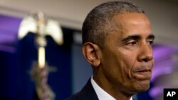 President Barack Obama pauses while speaking in the White House briefing room in Washington, June 23, 2016.