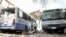 Damaged school buses are seen at the scene after a car exploded in a suicide attack near Mucassar primary and secondary school in Hodan district of Mogadishu, Somalia, Nov. 25, 2021. 