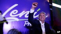 Lenin Moreno, presidential candidate for the ruling party Alliance PAIS, celebrates the closing of the polls for the general election, in Quito, Ecuador, Sunday, Feb. 19, 2017.