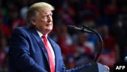 FILE - President Donald Trump speaks during a campaign rally at the BOK Center on June 20, 2020 in Tulsa, Oklahoma.