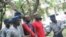 Occupy Africa Leaders Itai Dzamara (left) and Tichaona Danho (right) detained by police