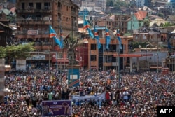 A crowd listens to speeches by leaders of the M23 rebel group during a rally at Place de l’Independance in Bukavu, Democratic Republic of Congo, on Feb. 27, 2025. Moments later, two explosions rocked the area.