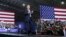 President Donald Trump walks toward the podium to speak at a rally at Total Sports Park, April 28, 2018, in Washington, Mich.