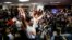 Supporters of Future Forward Party react after Thailand's Constitutional Court ruled that key figures of the opposition Future Forward Party were not guilty of opposing the monarchy, at the party's headquarters in Bangkok, Thailand Jan. 21, 2020.
