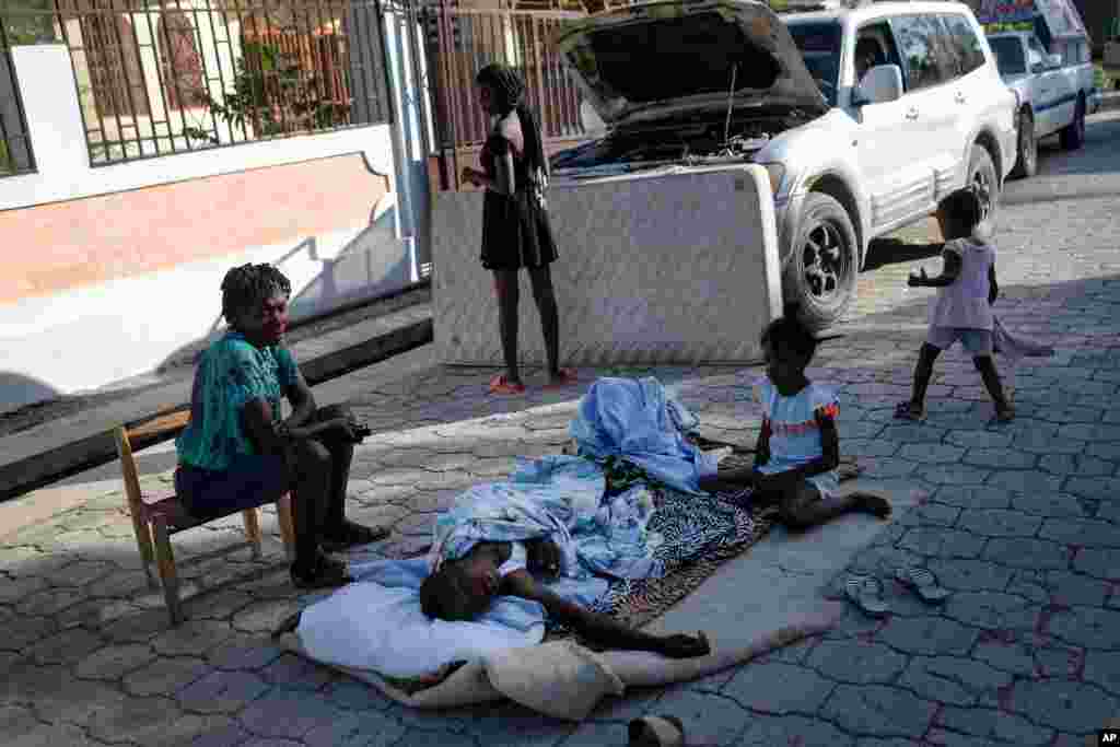 Residents stay outside their homes amid the fear of aftershocks in Saint-Louis-du-Sud, Haiti.