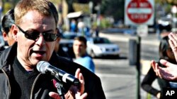 Cleve Jones joins to dedicate a San Francisco street car in the memory of his political mentor, Harvey Milk, California's first openly gay elected public official – Milk was assassinated in 1978