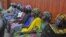 Some of the escaped kidnapped girls of the government secondary school Chibok, attend a meeting with Borno state governor, Kashim Shettima, in Maiduguri, Nigeria, June 2, 2014. 