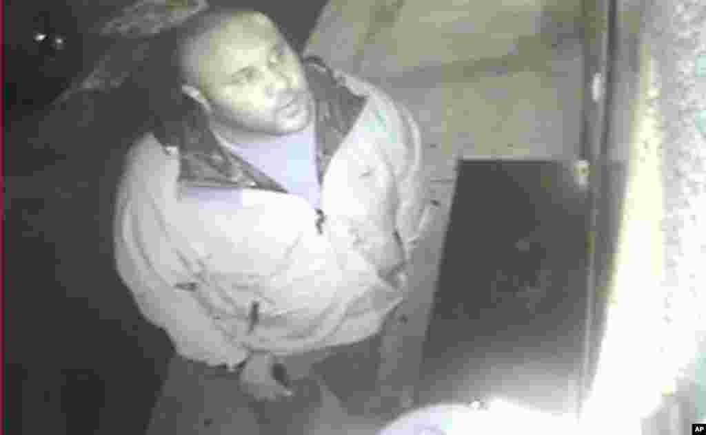 This image provided by the Irvine Police Department shows Christopher Dorner on a Jan. 28, 2013 surveillance video at an Orange County, California hotel. 